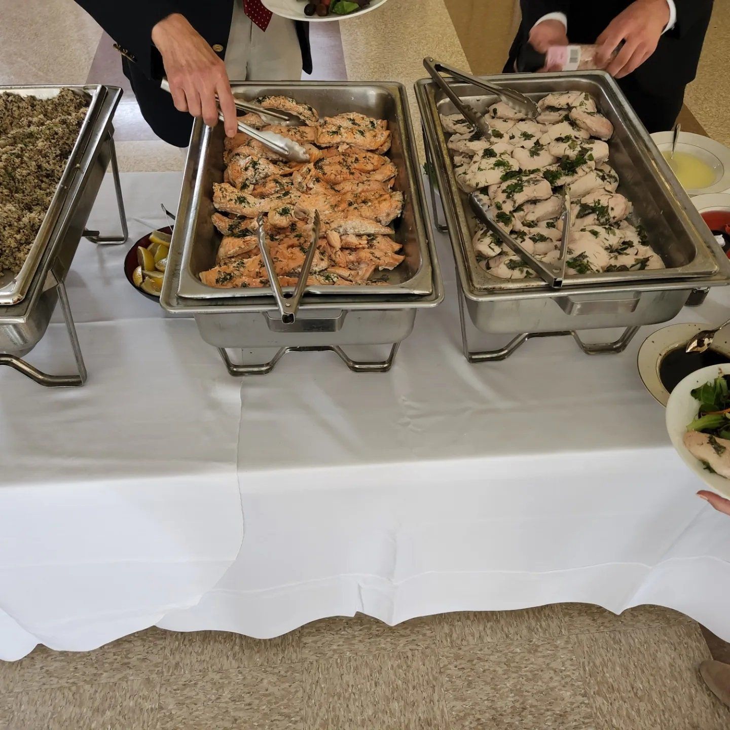 People getting meal on a tray