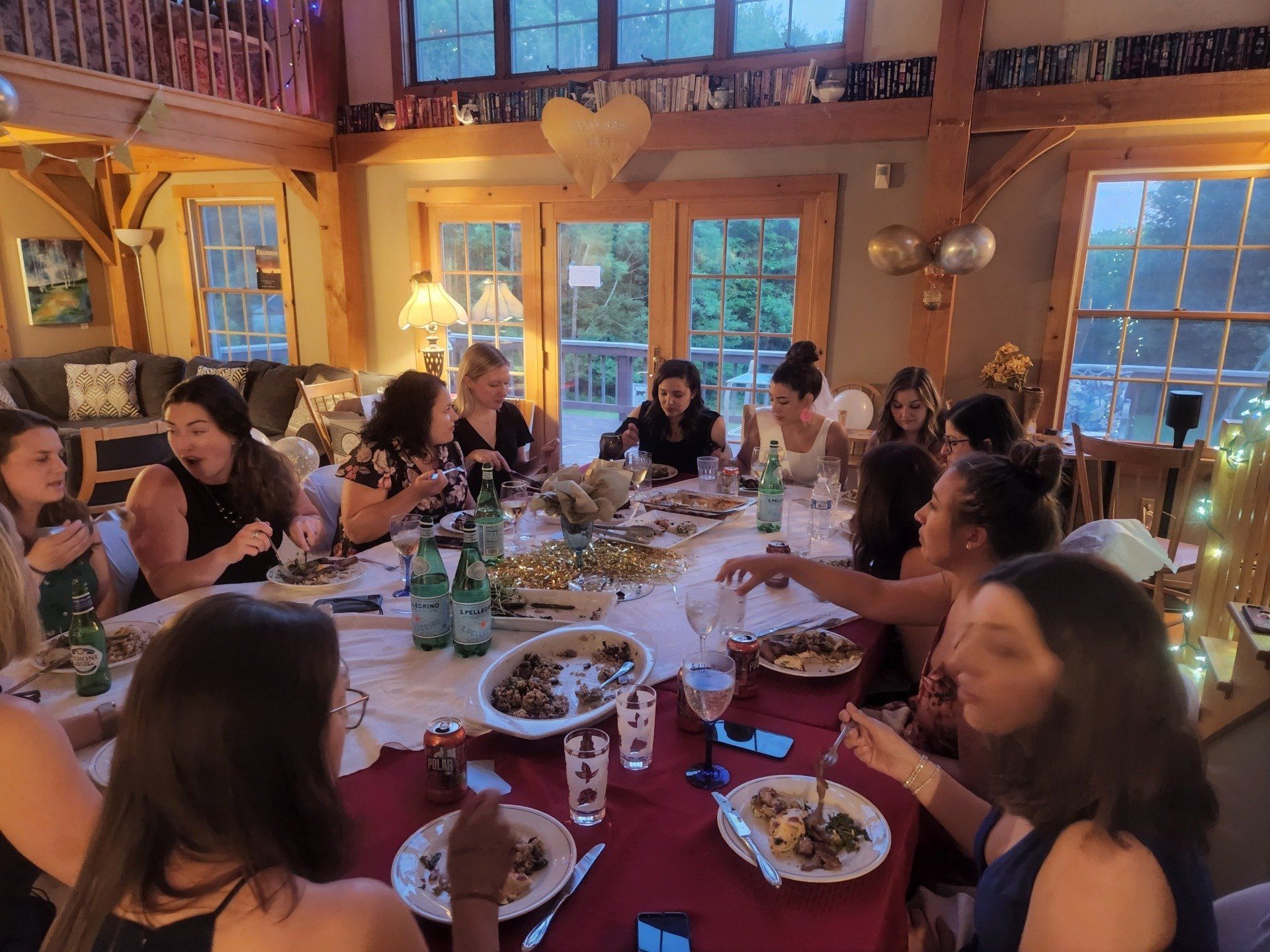 All women eating and drinking on a table