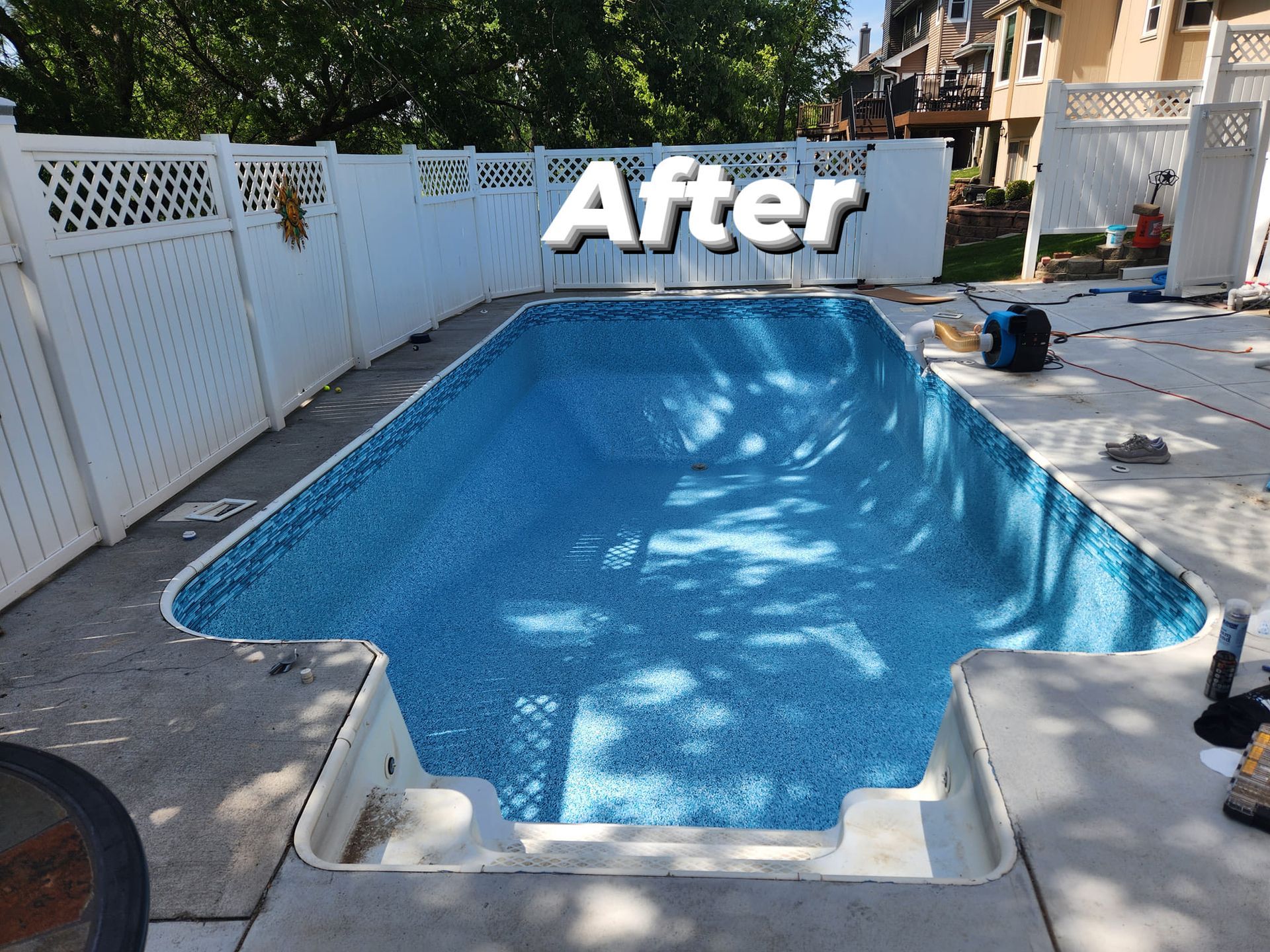 A picture of a swimming pool after being remodeled
