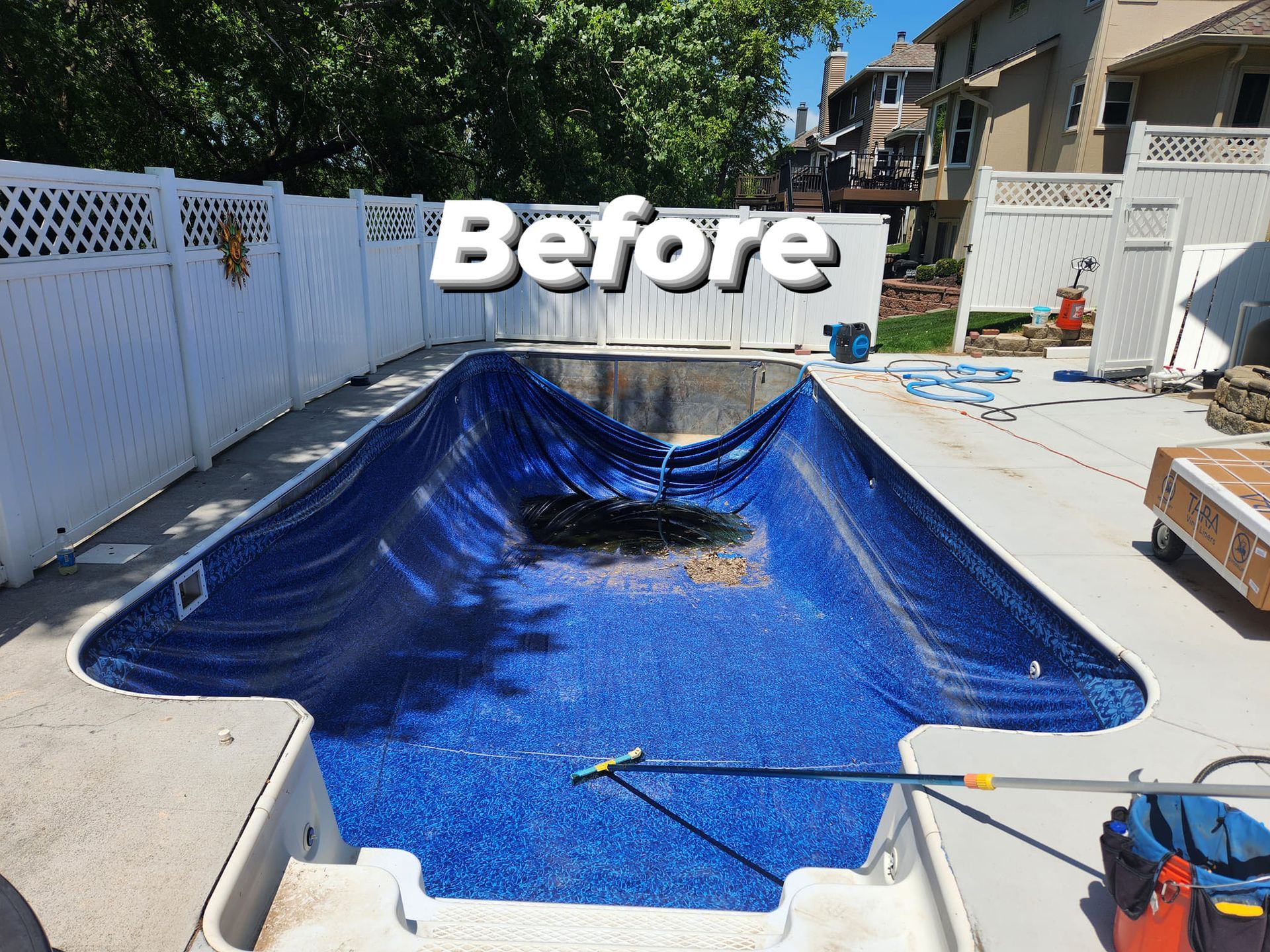 A picture of a swimming pool before being remodeled