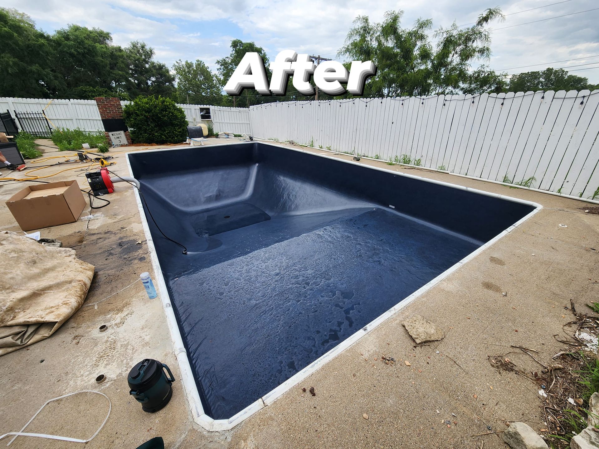 A picture of a swimming pool after being built