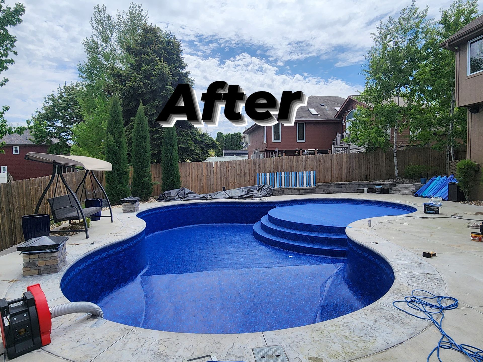 A picture of a swimming pool after being remodeled.