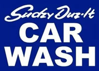 Blue sign for Sudzy Duz-it Car Wash with white lettering.