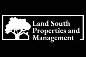 The logo for Land South Properties and Management