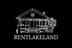 A white house with a porch and the word Rent Lakeland on a white background