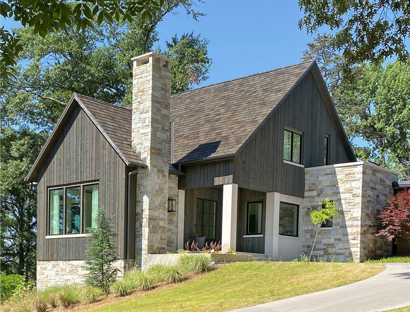 A house with a chimney on the side of it