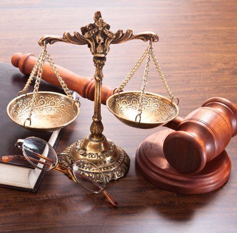 Gavel, justice scale and legal book