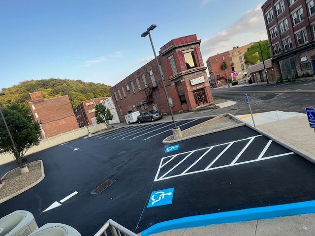 a parking lot with a handicap sign