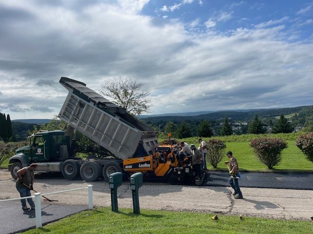 asphalt pavers working
