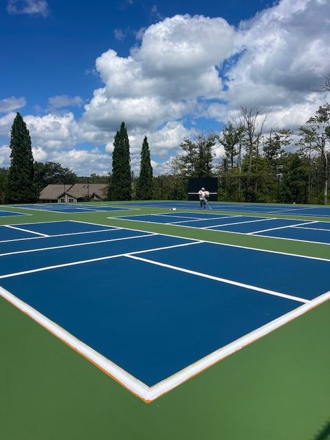 a tennis court on a sunny day