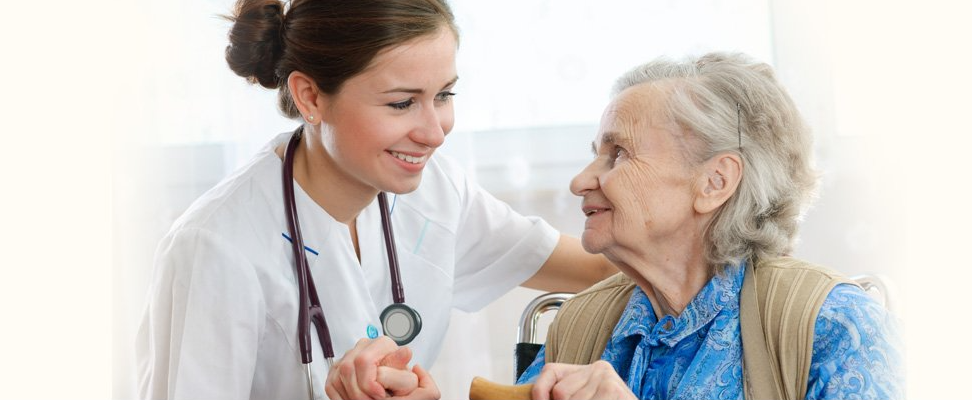 Doctor helping older woman