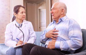 An old man consulting the doctor