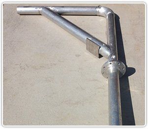 A galvanized steel wall-mounted bracket arm with a reinforced diagonal brace and a circular flange for mounting.