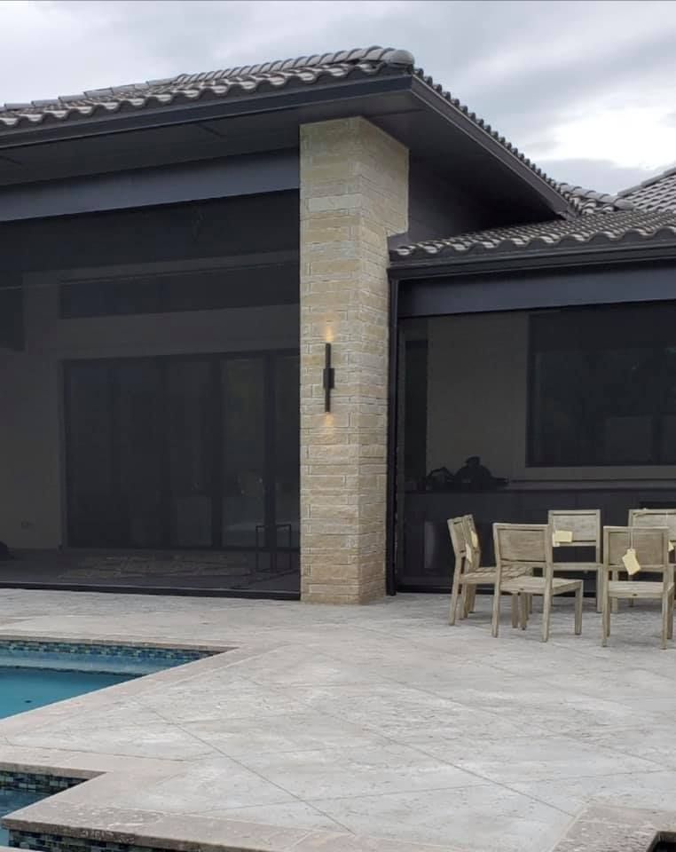 Motorized patio screens