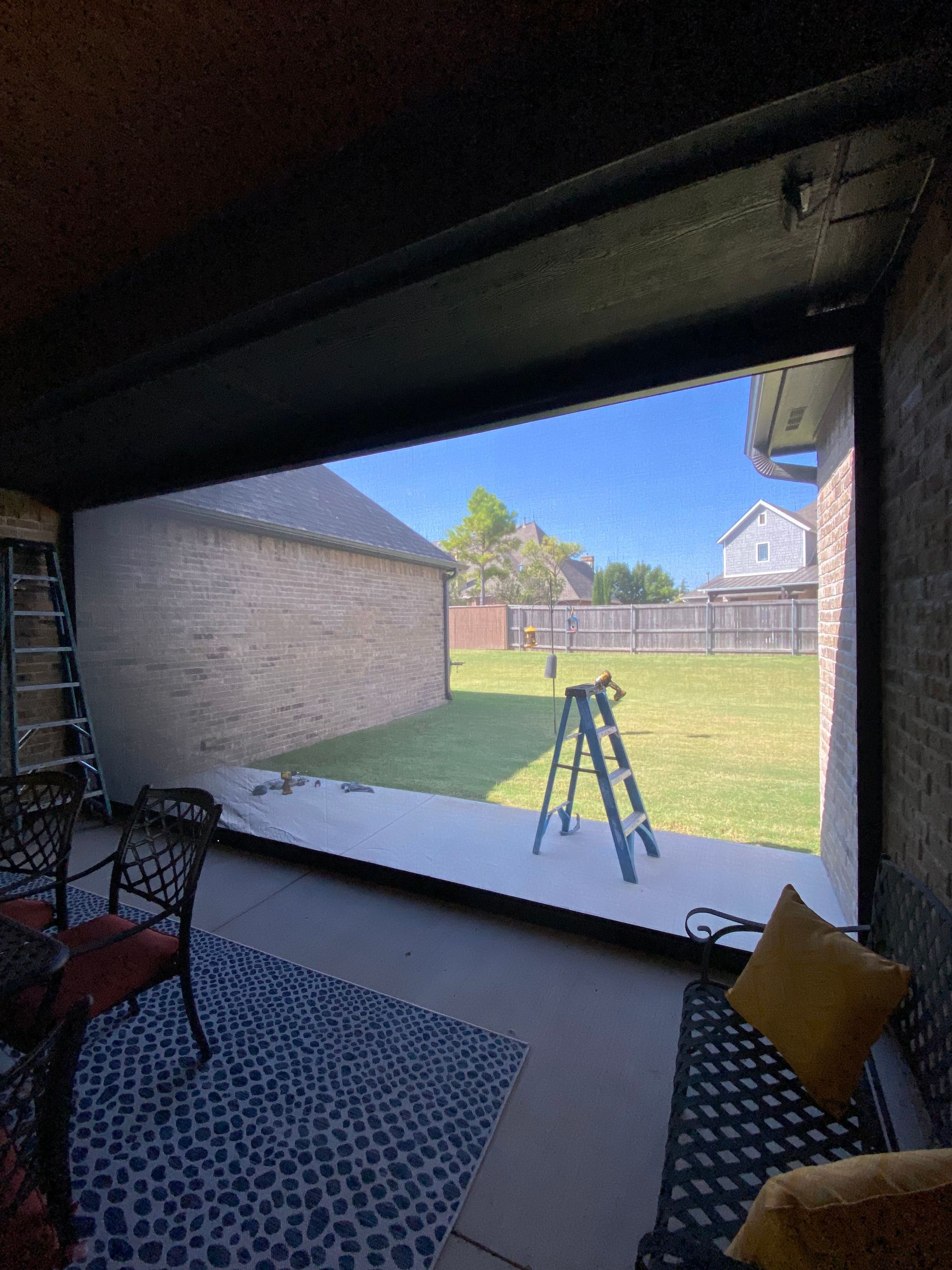 Motorized patio screens