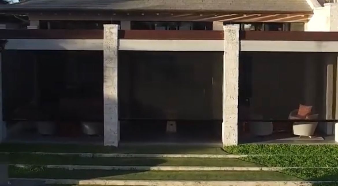 Motorized patio screens