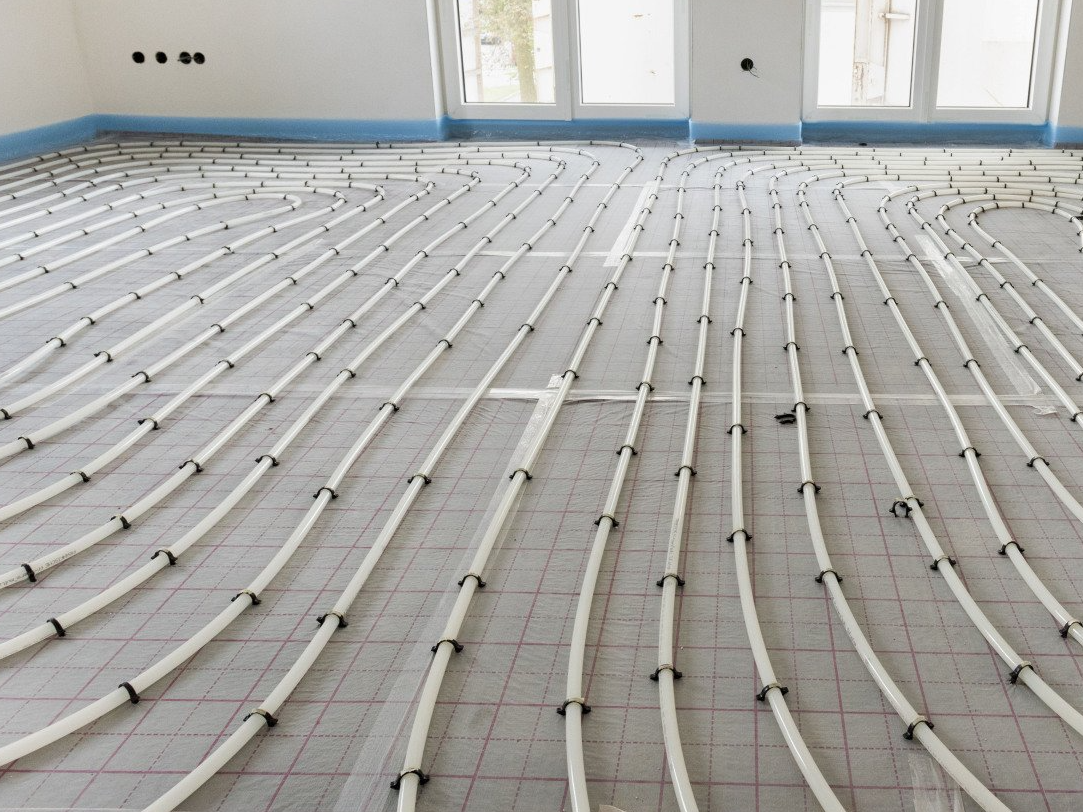A room with a lot of pipes on the floor