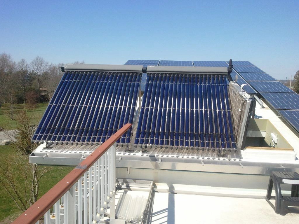 A roof with a lot of solar panels on it
