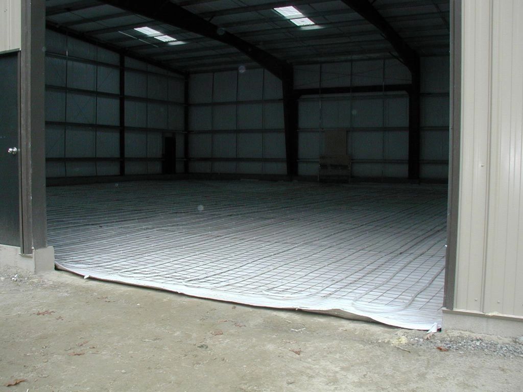 The inside of a building with a concrete floor