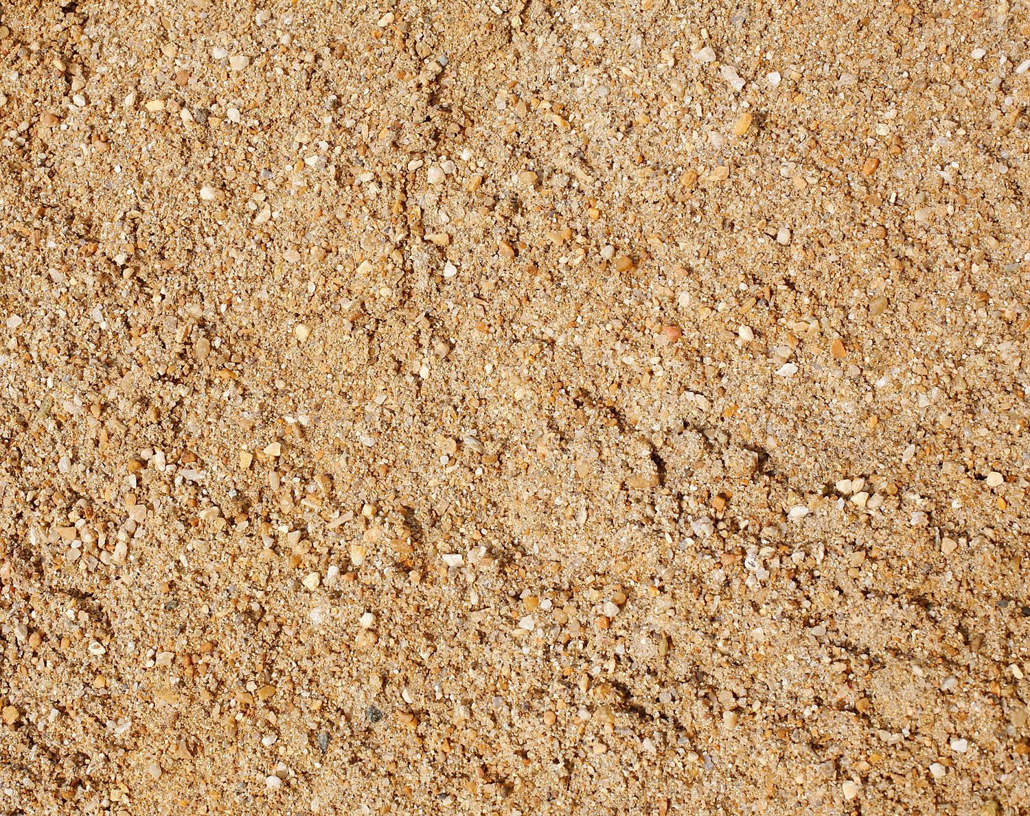 It is a close up of a pile of sand.