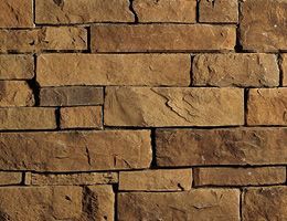 A close up of a pile of black mulch.