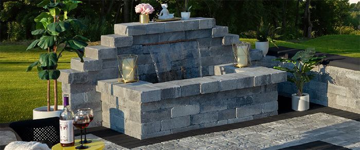 A pile of gravel is sitting on the ground.