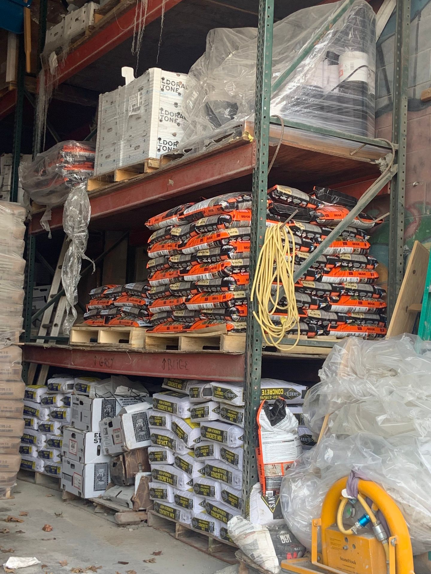 A warehouse filled with lots of bags of cement