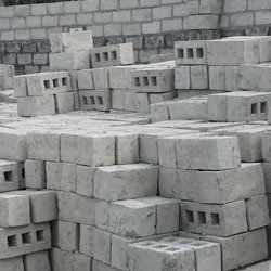 A pile of concrete blocks stacked on top of each other.