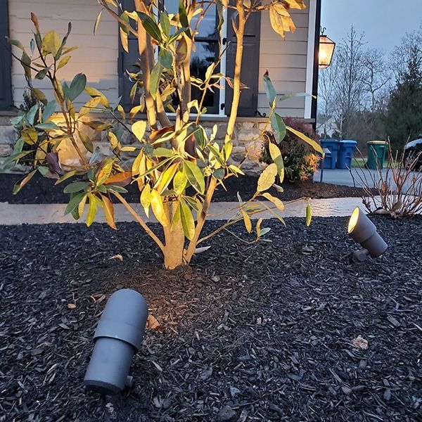 A pile of gravel is sitting on the ground.