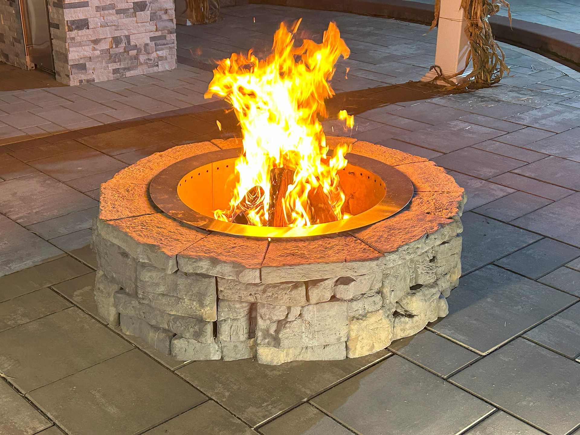 A pile of gravel is sitting on the ground.