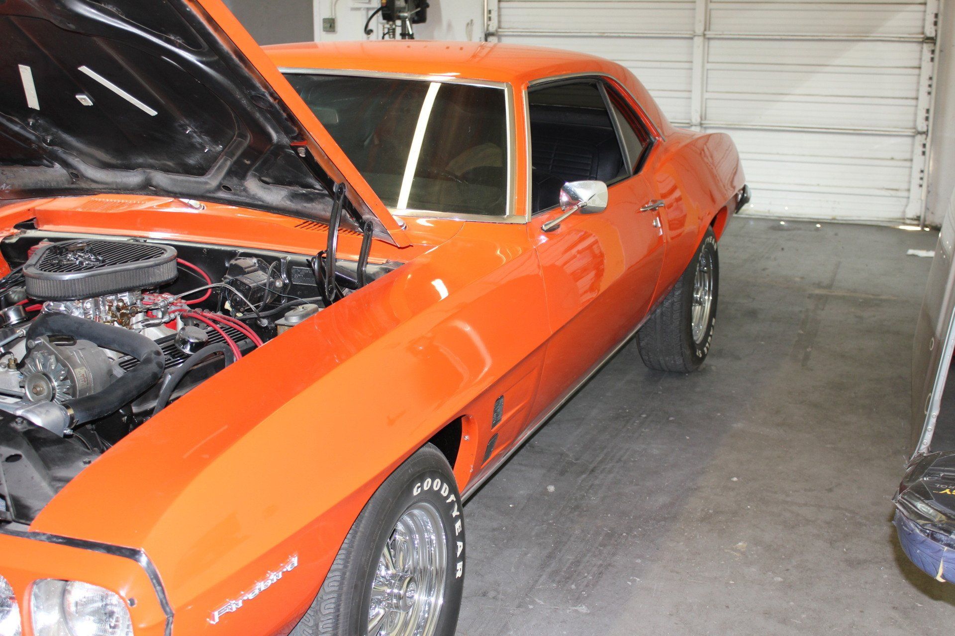sideview of classic orange car