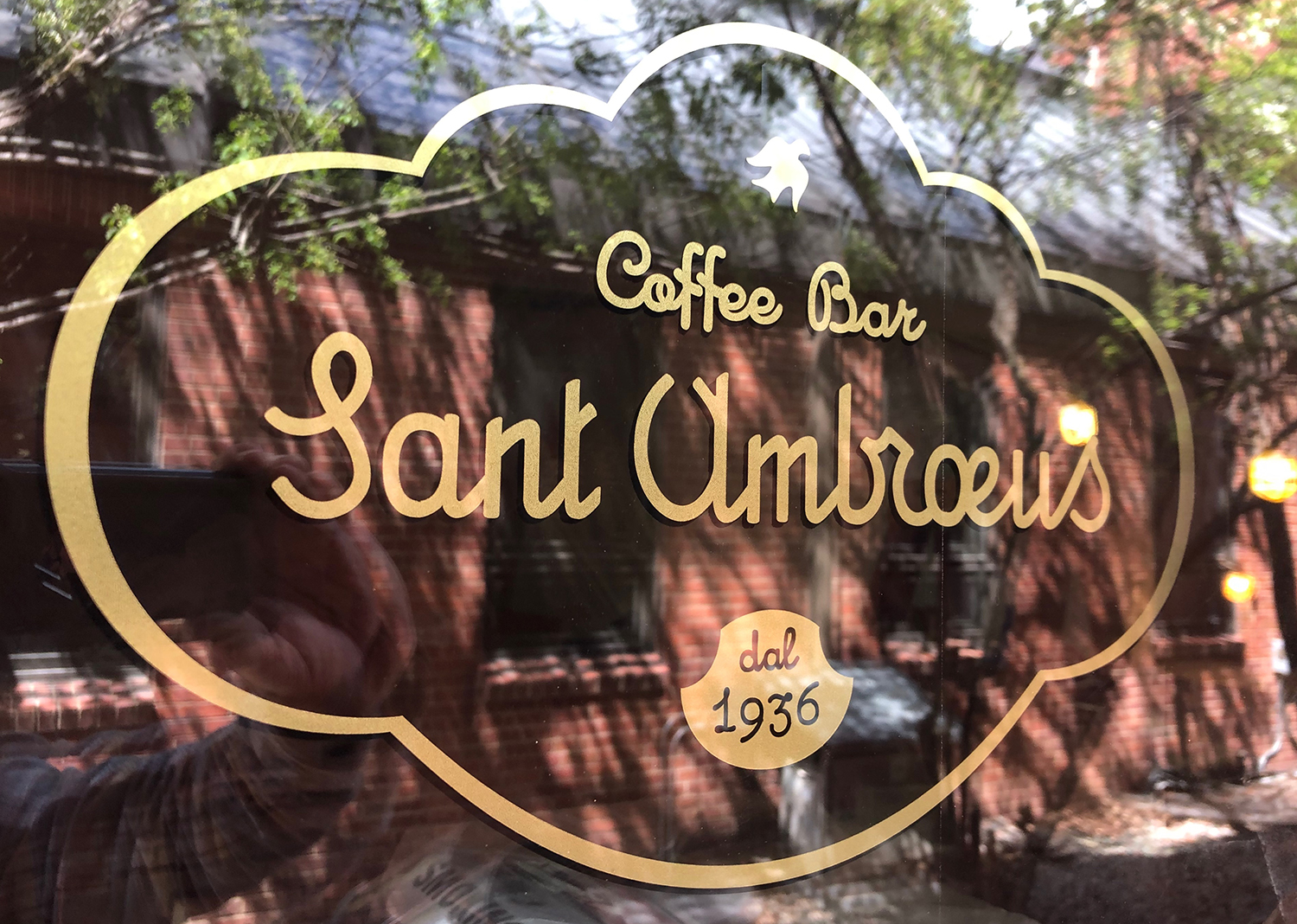A sign for a coffee bar called sant ambroeus