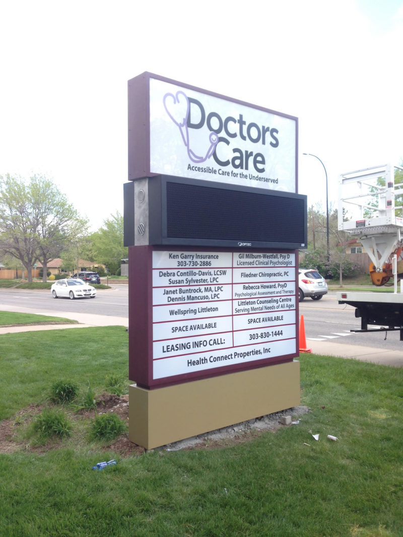A large sign that says doctors care on it