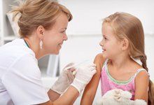 Little girl having her vaccine