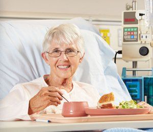 Patient eating her meal