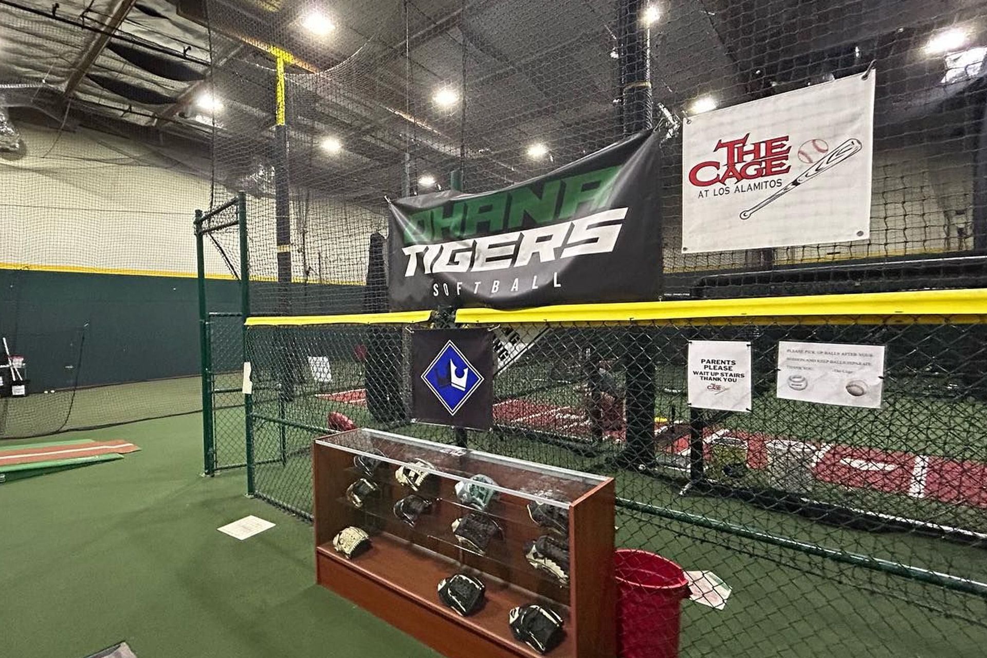 A baseball stadium with a sign that says tigers on it.