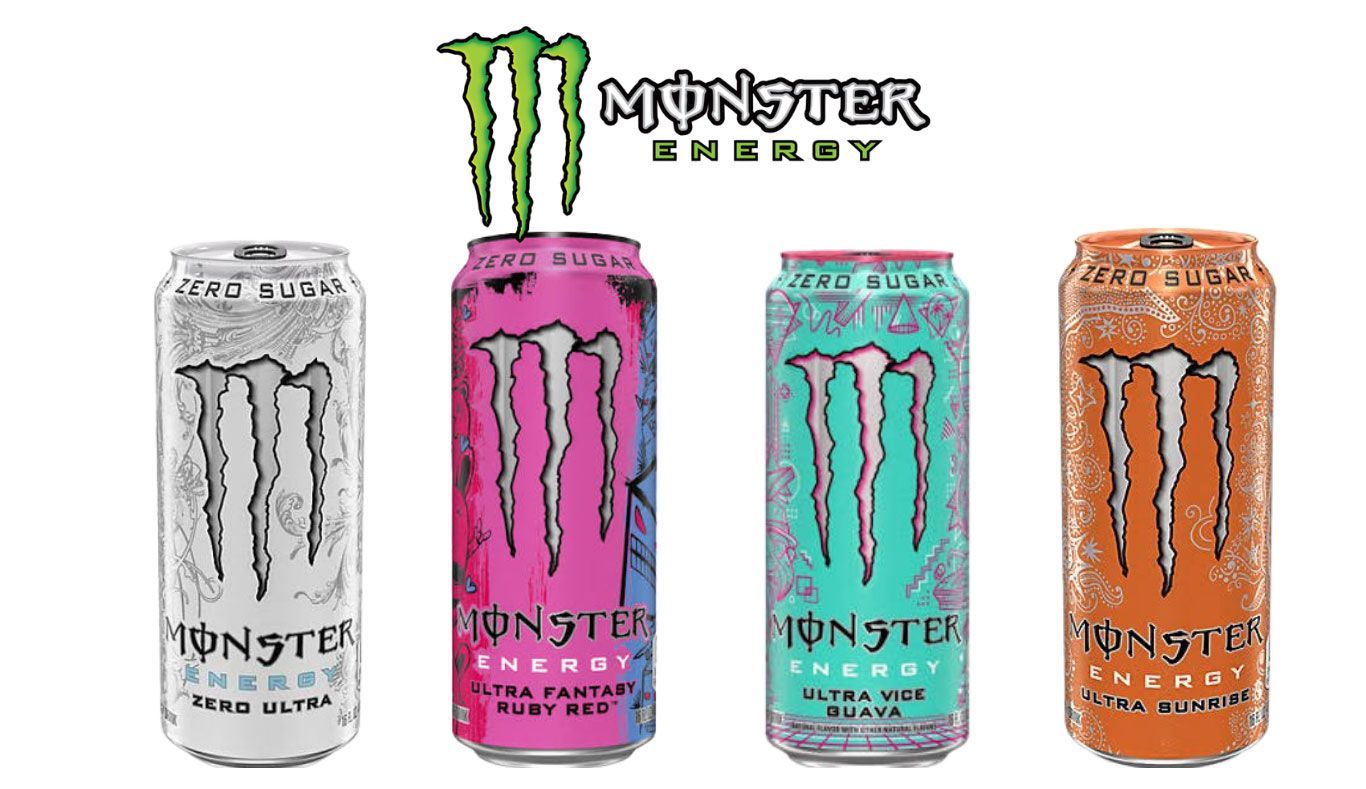 Four Monster Energy cans in white, pink, teal, and orange on a white background.