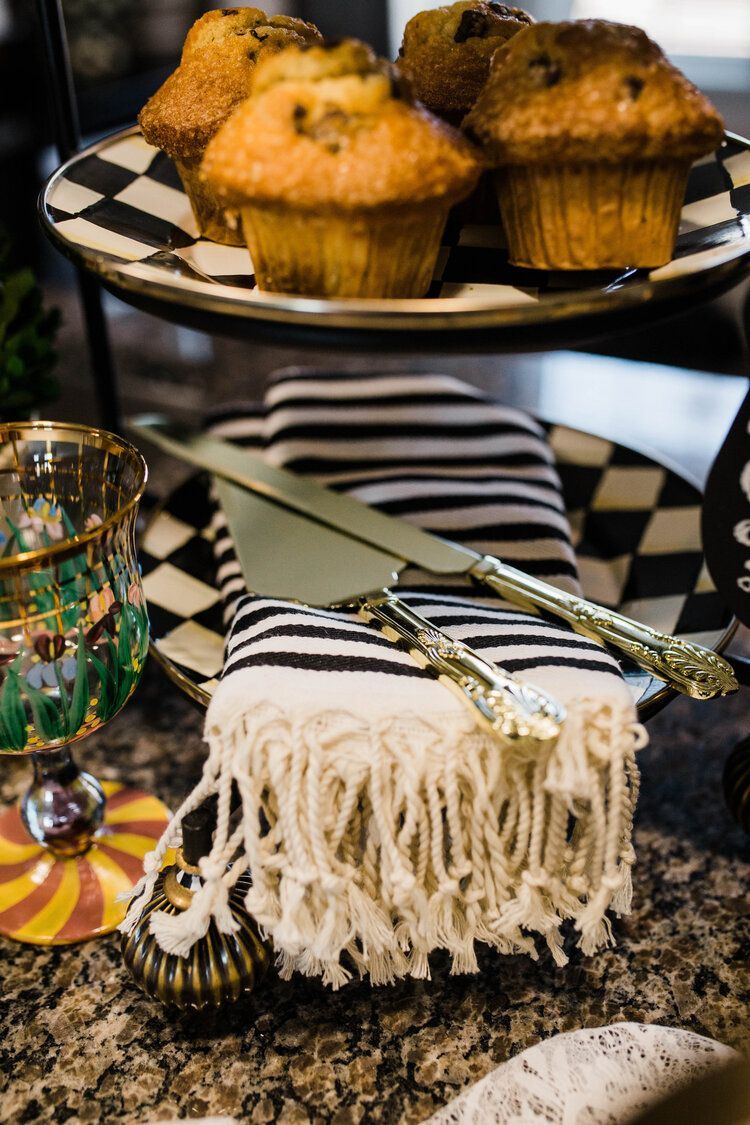 A close up of a plate of muffins on a table.