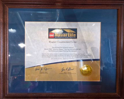 Framed GAF Master Elite certificate with gold seal on blue matting