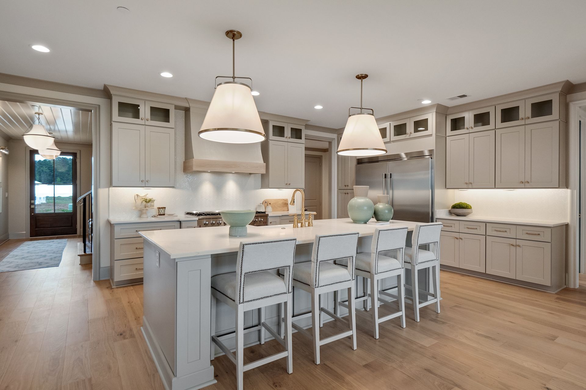 There is a large island in the middle of the kitchen.