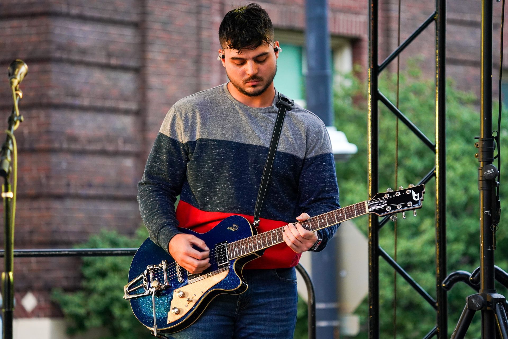 man playing a guitar