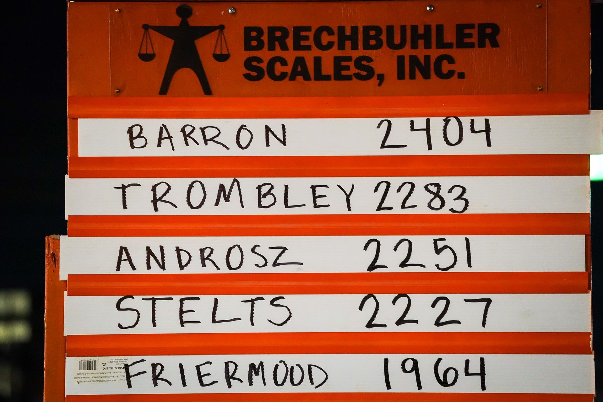 a sign that says brechtbuhler scales inc. on it