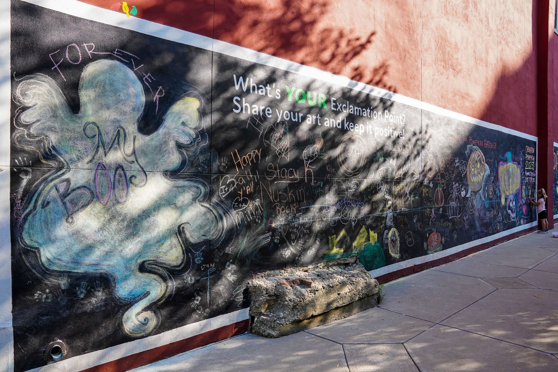 a large mural on the side of a building