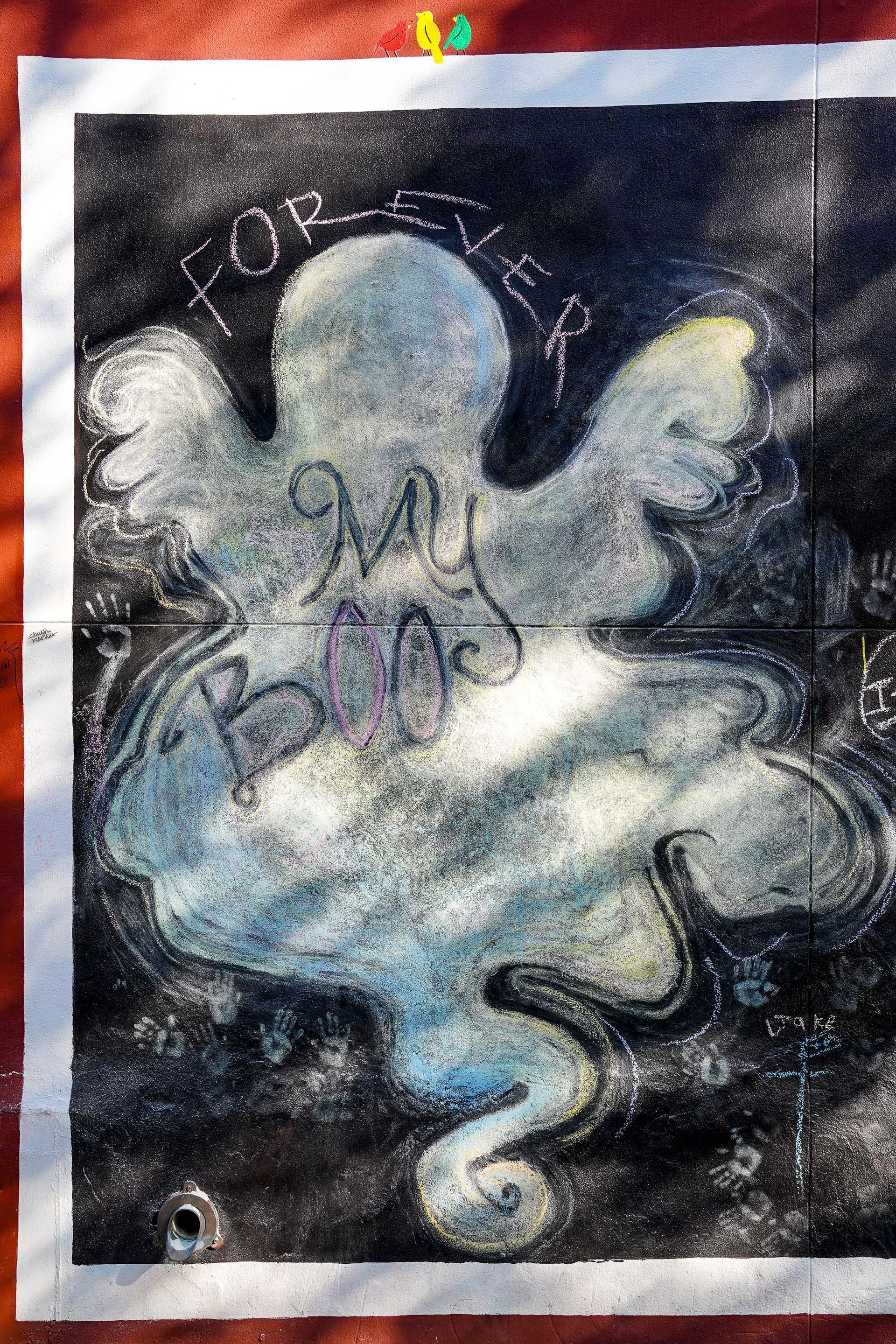 a painting of an octopus with the word forever written on it