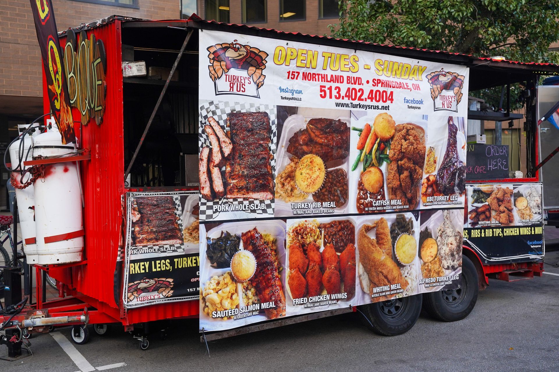 a group of women in black clothes are dancing on a stage