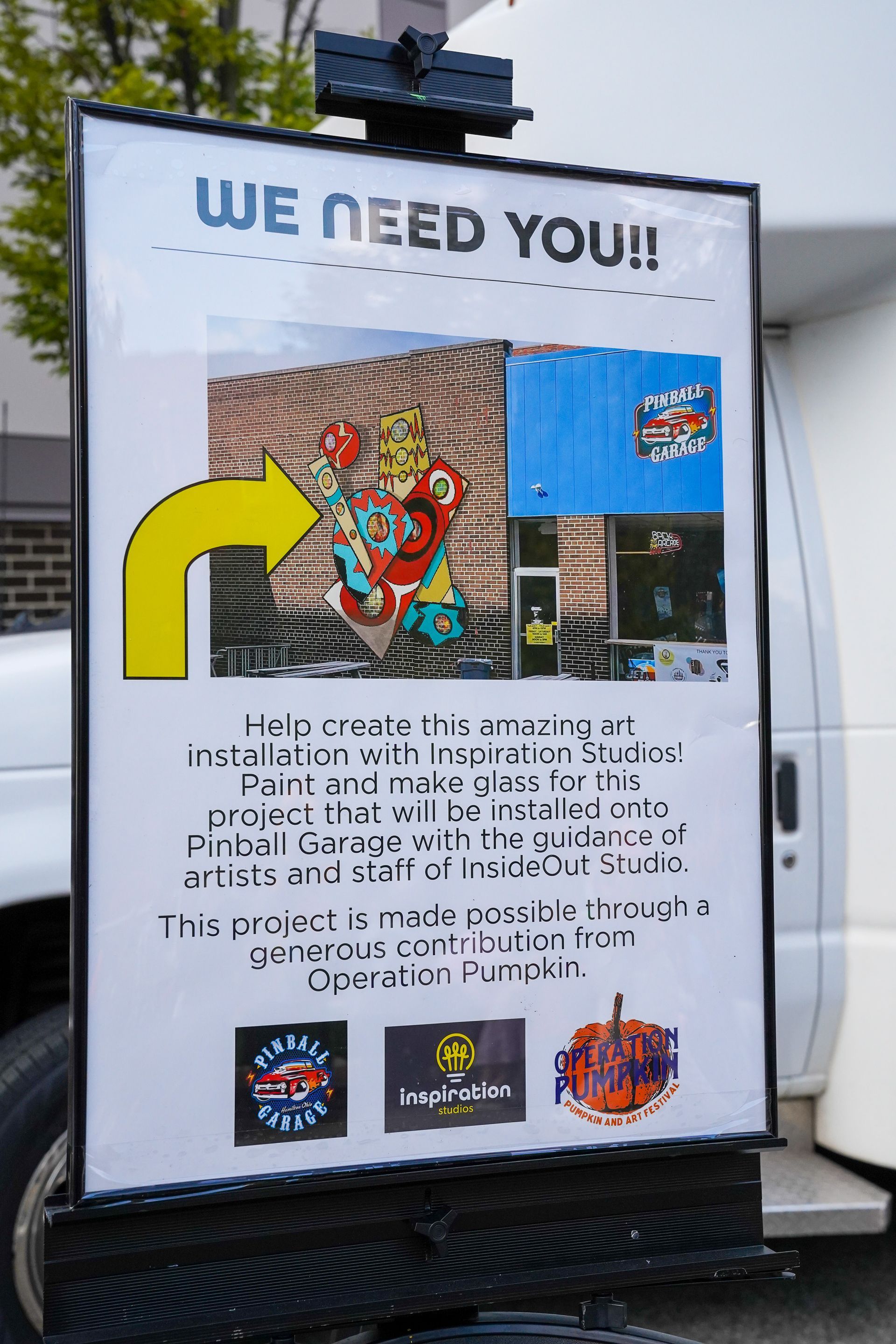 a sign that says we need you on it