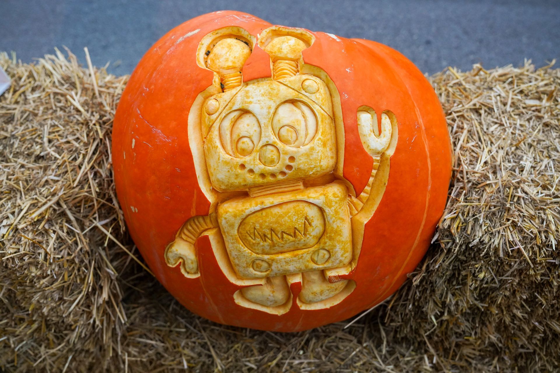 carved robot in a pumpkin