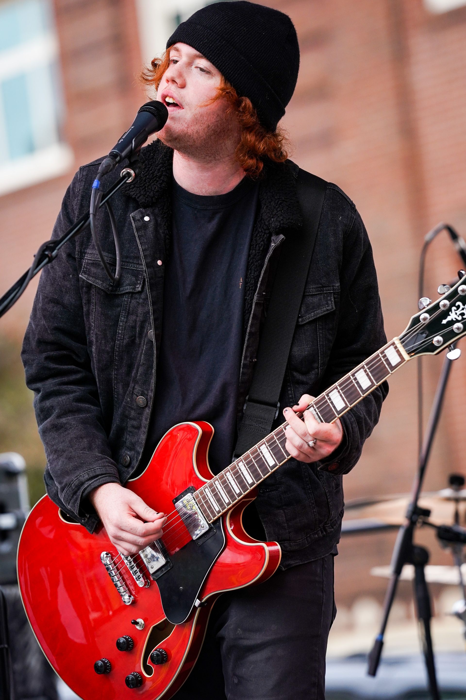 man playing a guitar