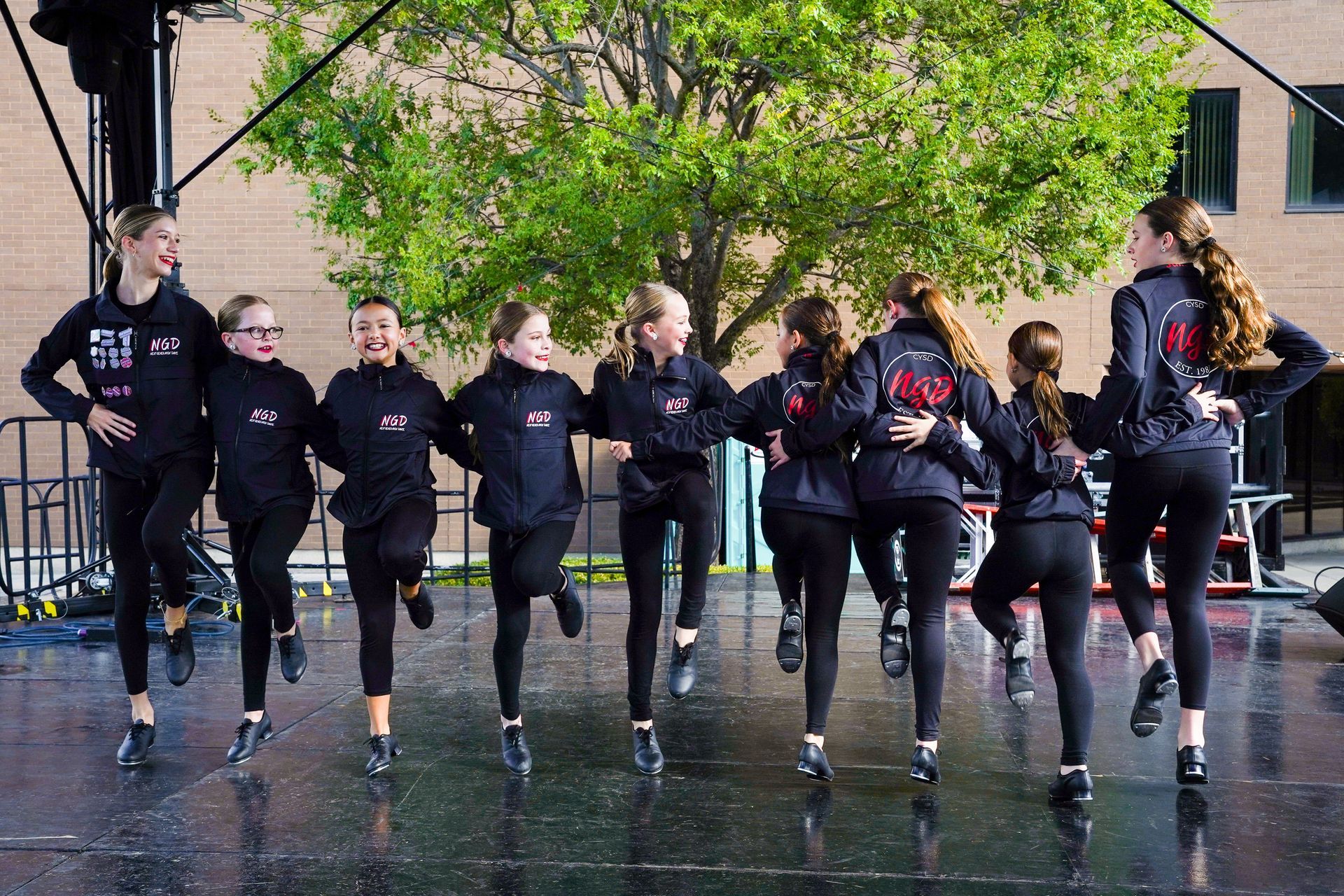 group of woman in black shirts
