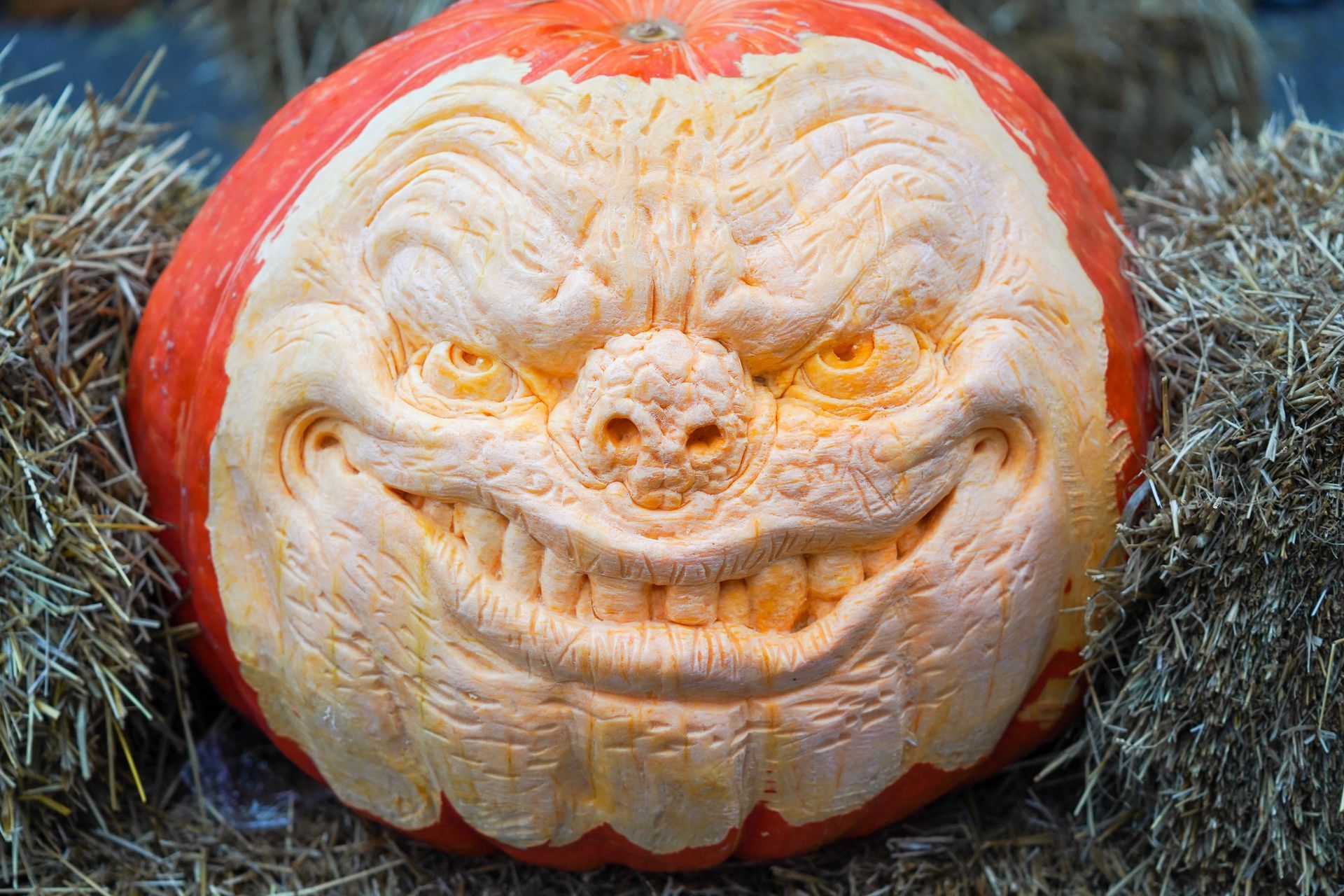 scary face carved in a pumpkin